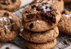 Freshly baked coffee cookies on a cooling rack