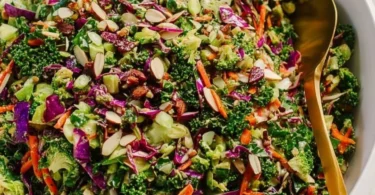A colorful detox salad with fresh vegetables and herbs promoting health and wellness.