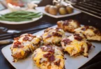 Juicy grilled Monterey Chicken garnished with fresh herbs and served with veggies.