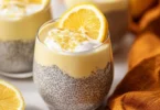 Bowl of Lemon Cream Chia Pudding made with oat milk, topped with lemon zest.