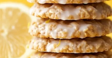 Lemon Oatmeal No-Bake Cookies on a white plate with a lemon wedge