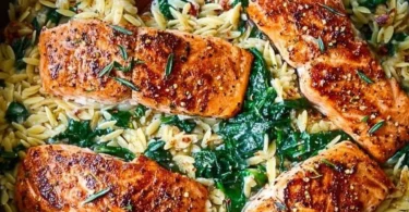 One Skillet Salmon served with Lemon Orzo, a healthy and flavorful recipe.