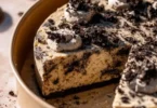 Delicious Oreo Cookie Cake with creamy frosting and crushed Oreos on top