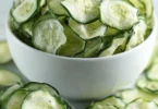 Crispy salt and vinegar cucumber chips served in a bowl